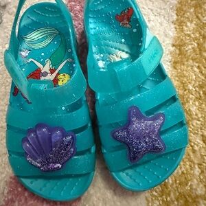 CROCS Kids Turquoise Sandals with Purple Accents